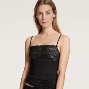 Kanten top met verstelbare schouderbandjes, Zwitsers kwaliteitsmerk.